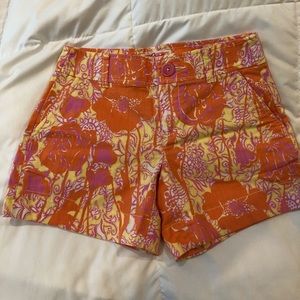 Lilly Pulitzer orange/pink floral shirt, size 0